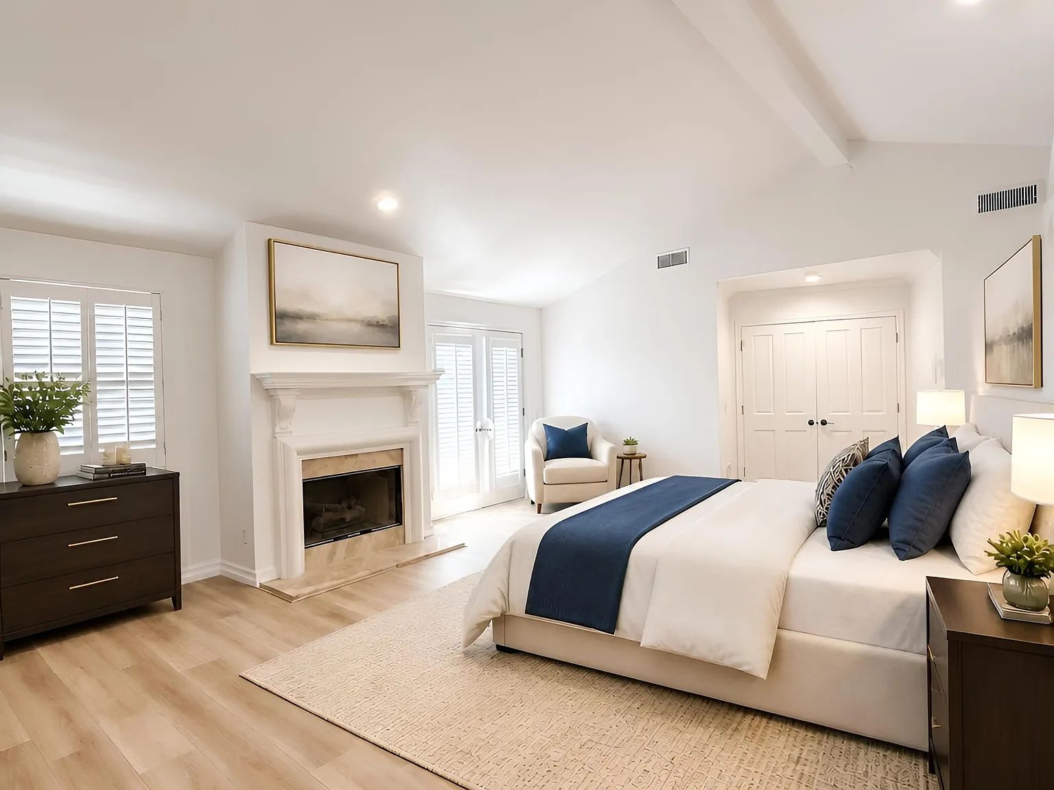 A bright bedroom with navy accents