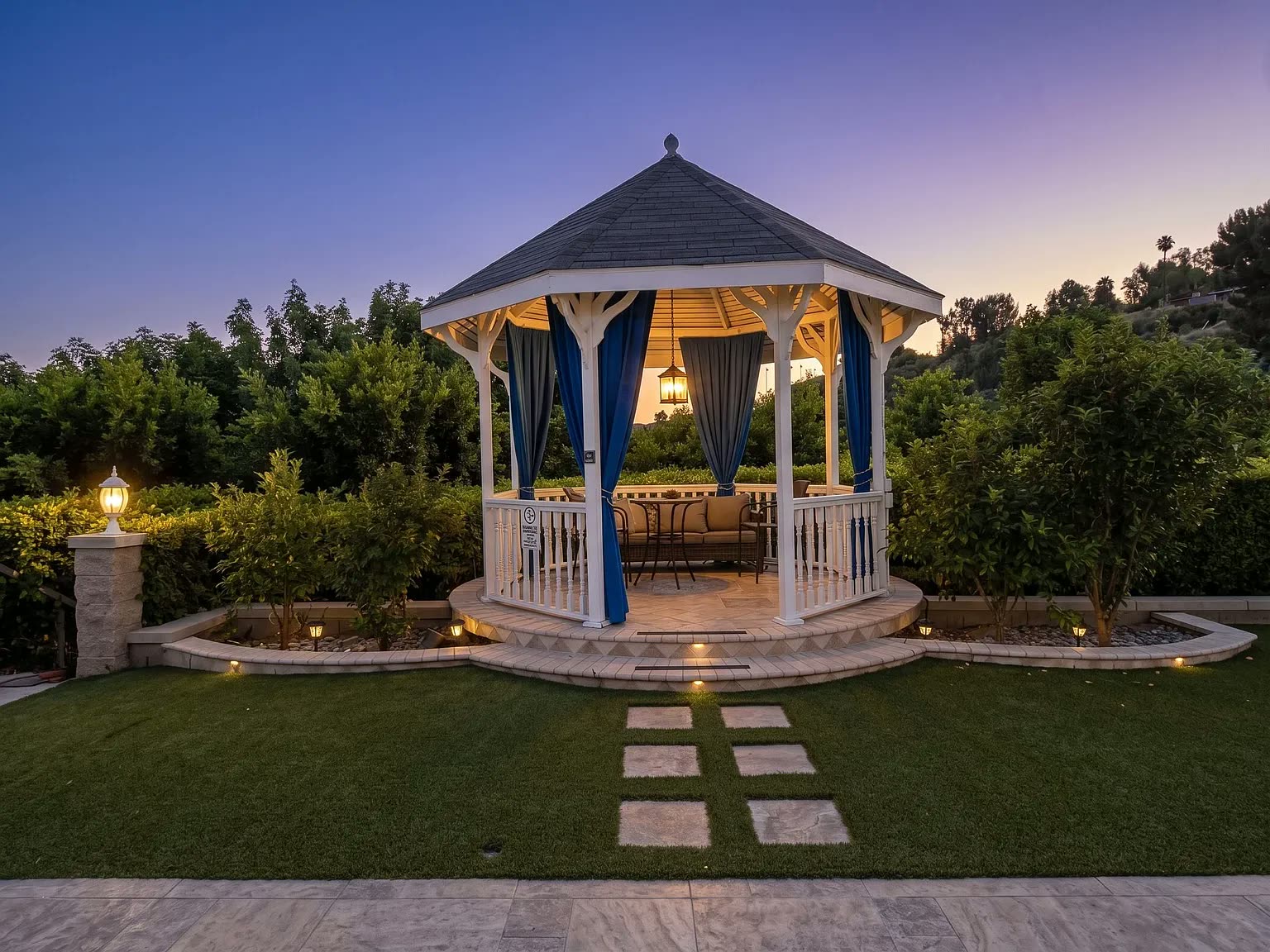 A gazebo on the lawn at the Next Phase residence