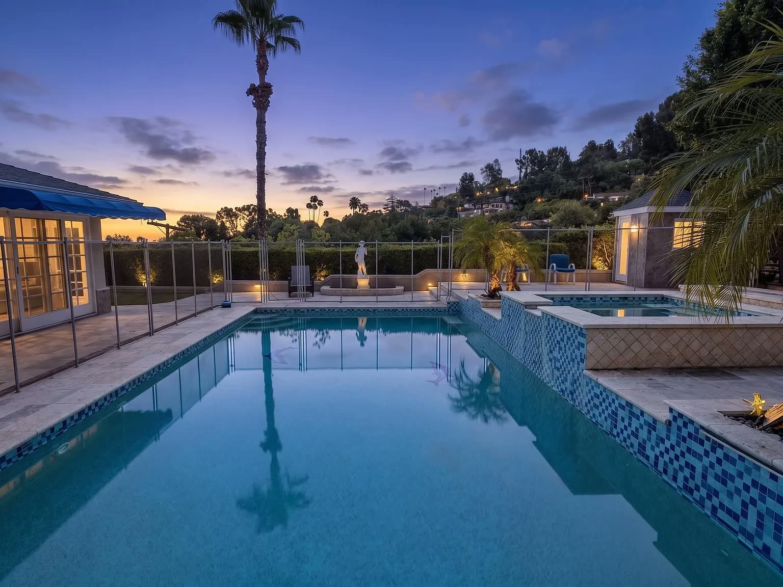 The pool at the Next Phase residence at sunset
