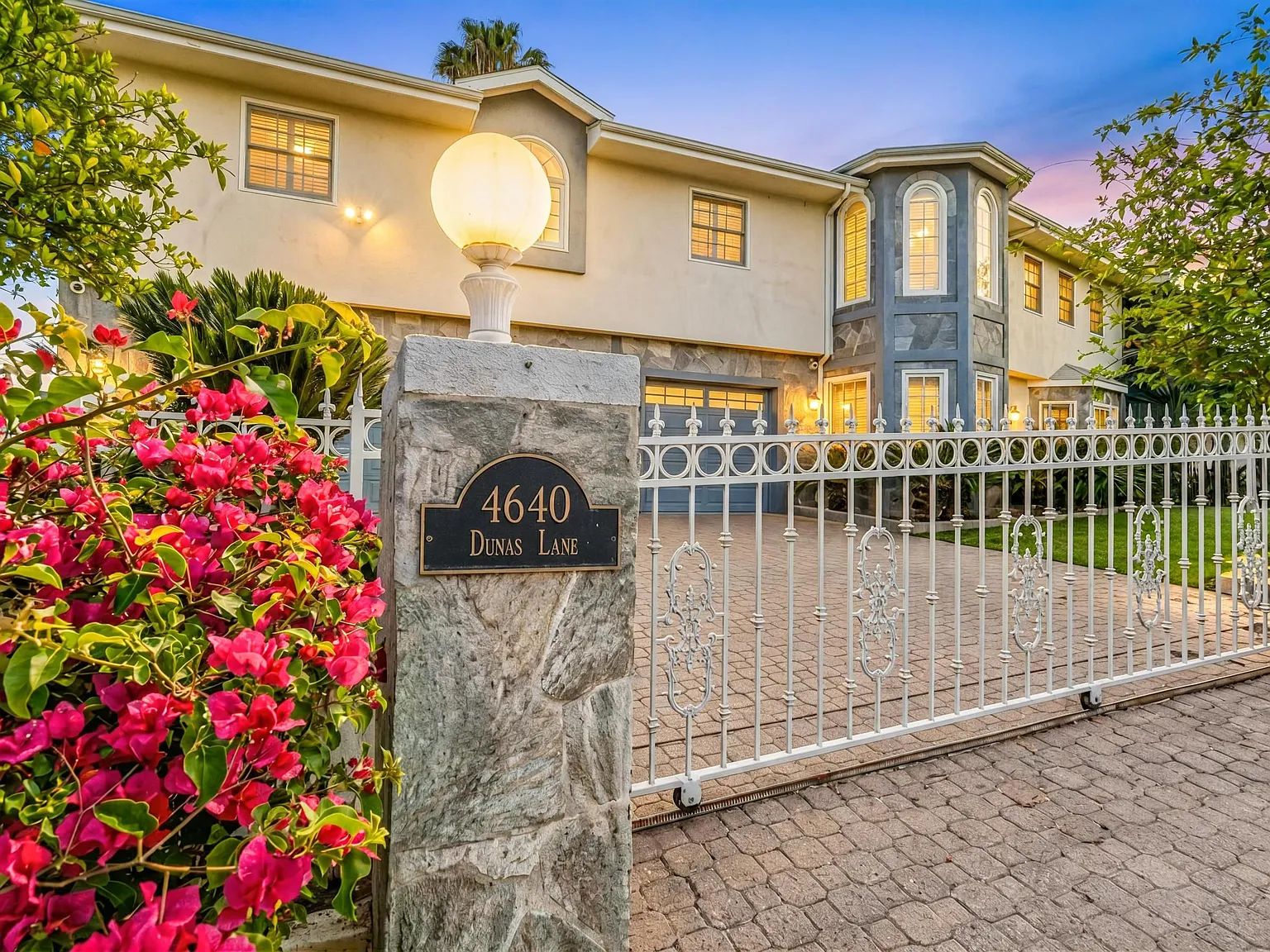 The front gate and gardens of the Next Phase residence